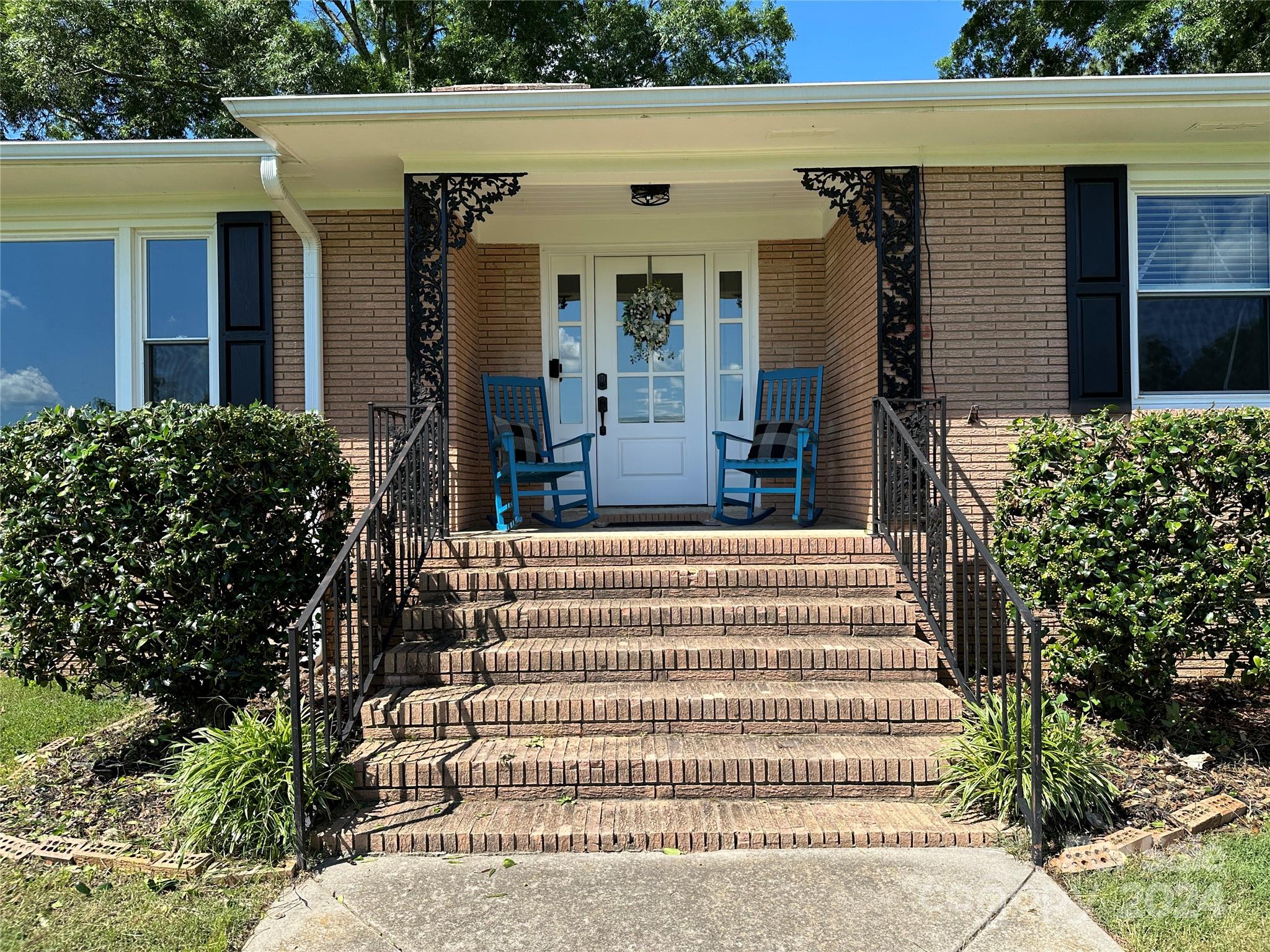 1118 Stack Road Monroe, NC 28112 - Photo 2 of 42 a front view of a house with a garden
