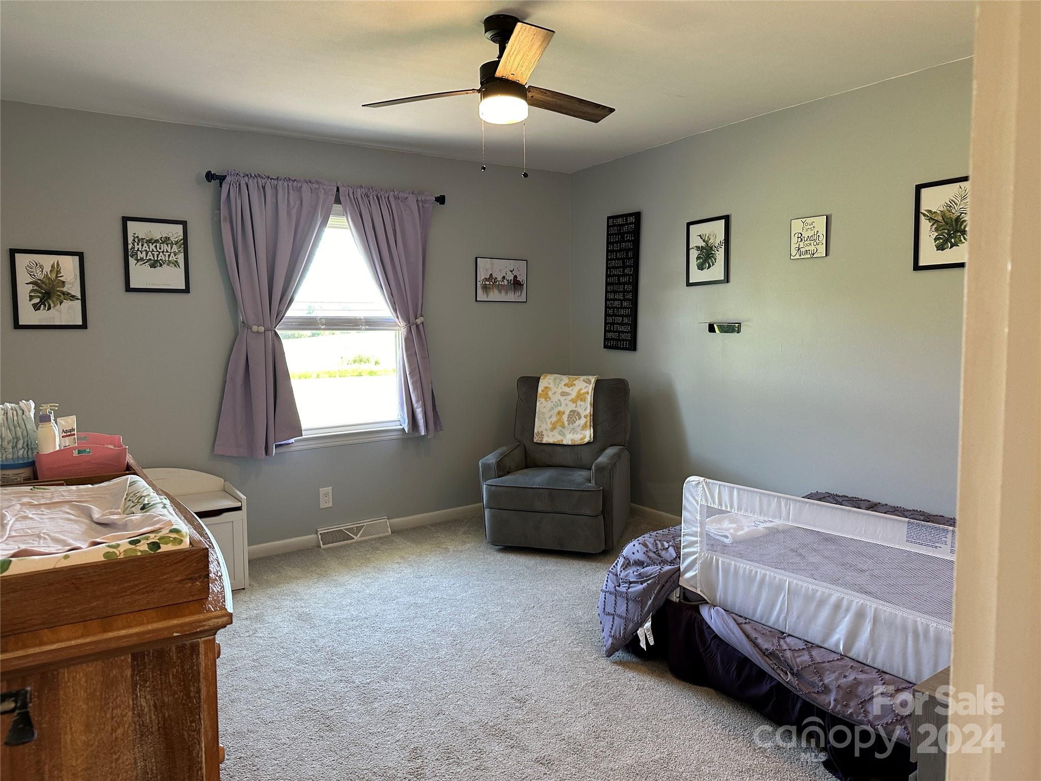1118 Stack Road Monroe, NC 28112 - Photo 22 of 42 a bedroom with a bed and a window