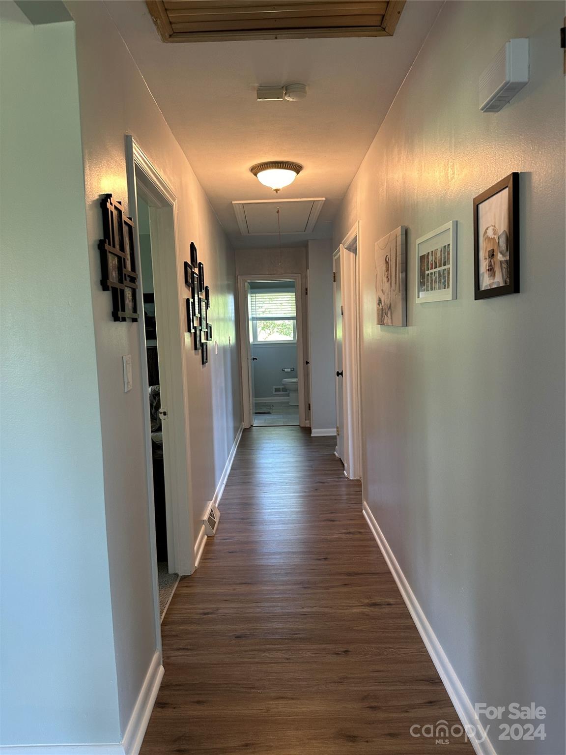 1118 Stack Road Monroe, NC 28112 - Photo 25 of 42 a view of a hallway with wooden floor