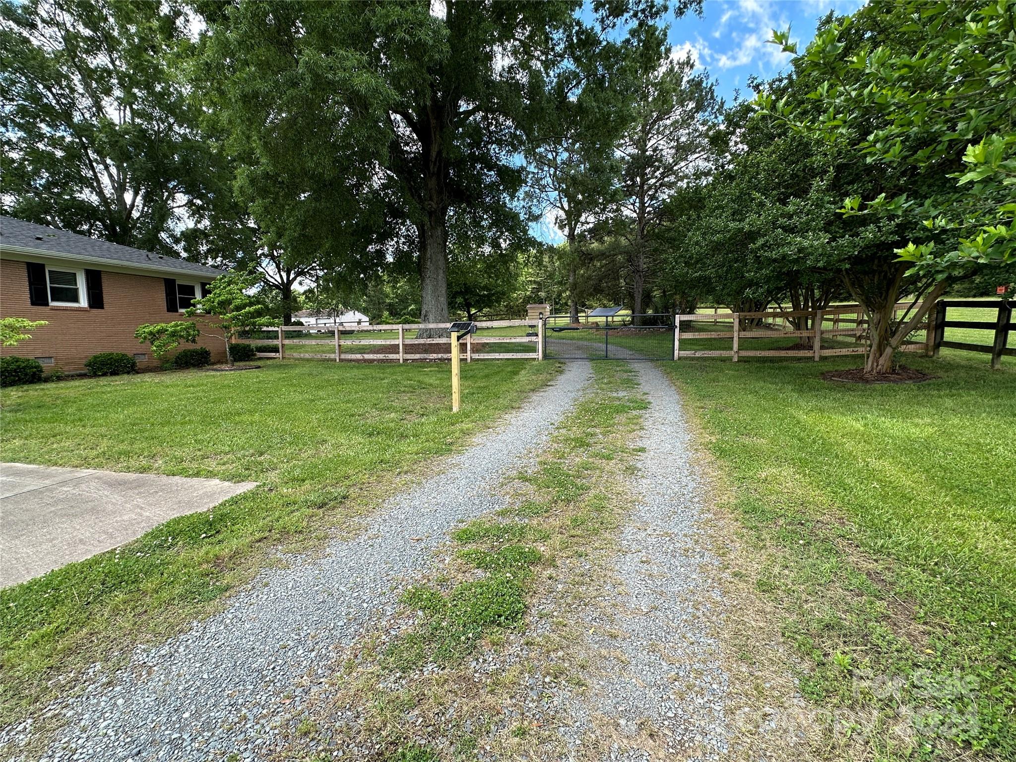 1118 Stack Road Monroe, NC 28112 - Photo 33 of 42 a view of a backyard with green space