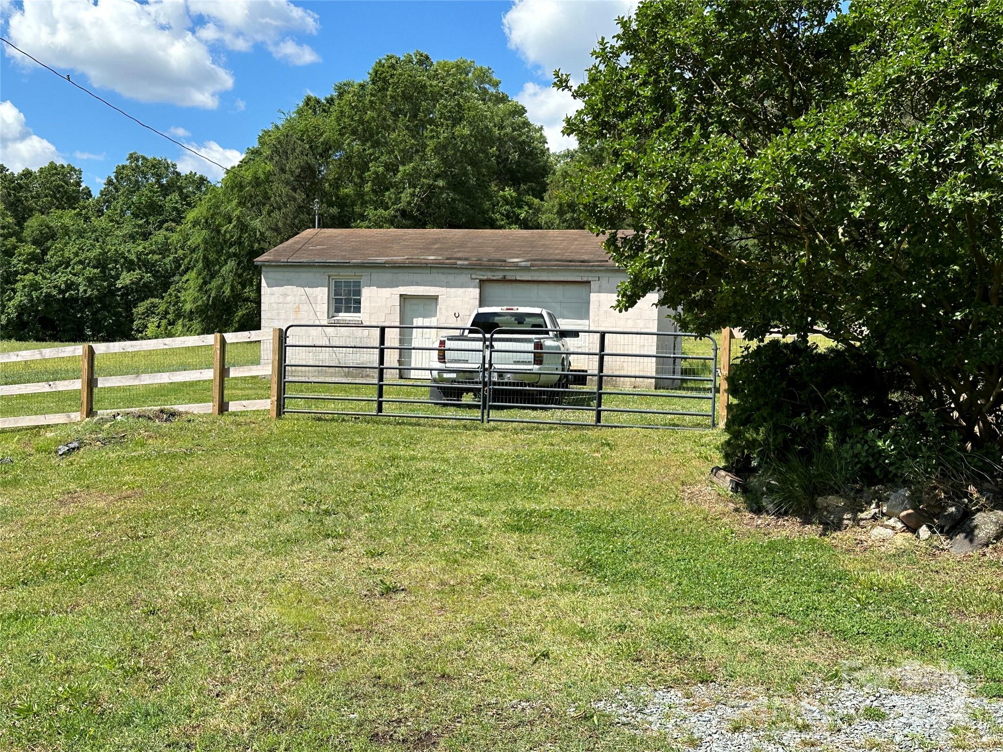 1118 Stack Road Monroe, NC 28112 - Photo 39 of 42 a view of a house with a backyard