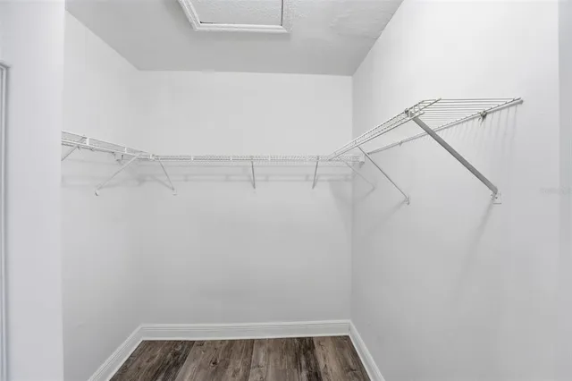 a view of a room with racks on the wall