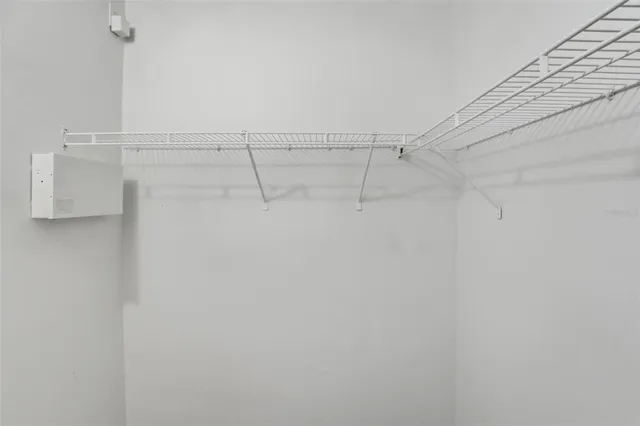 a view of a room with racks on the wall