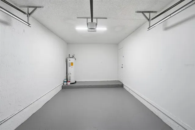 a view of empty room with ceiling fan