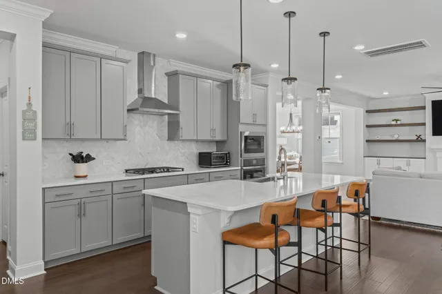 a bed sitting in a room next to a window