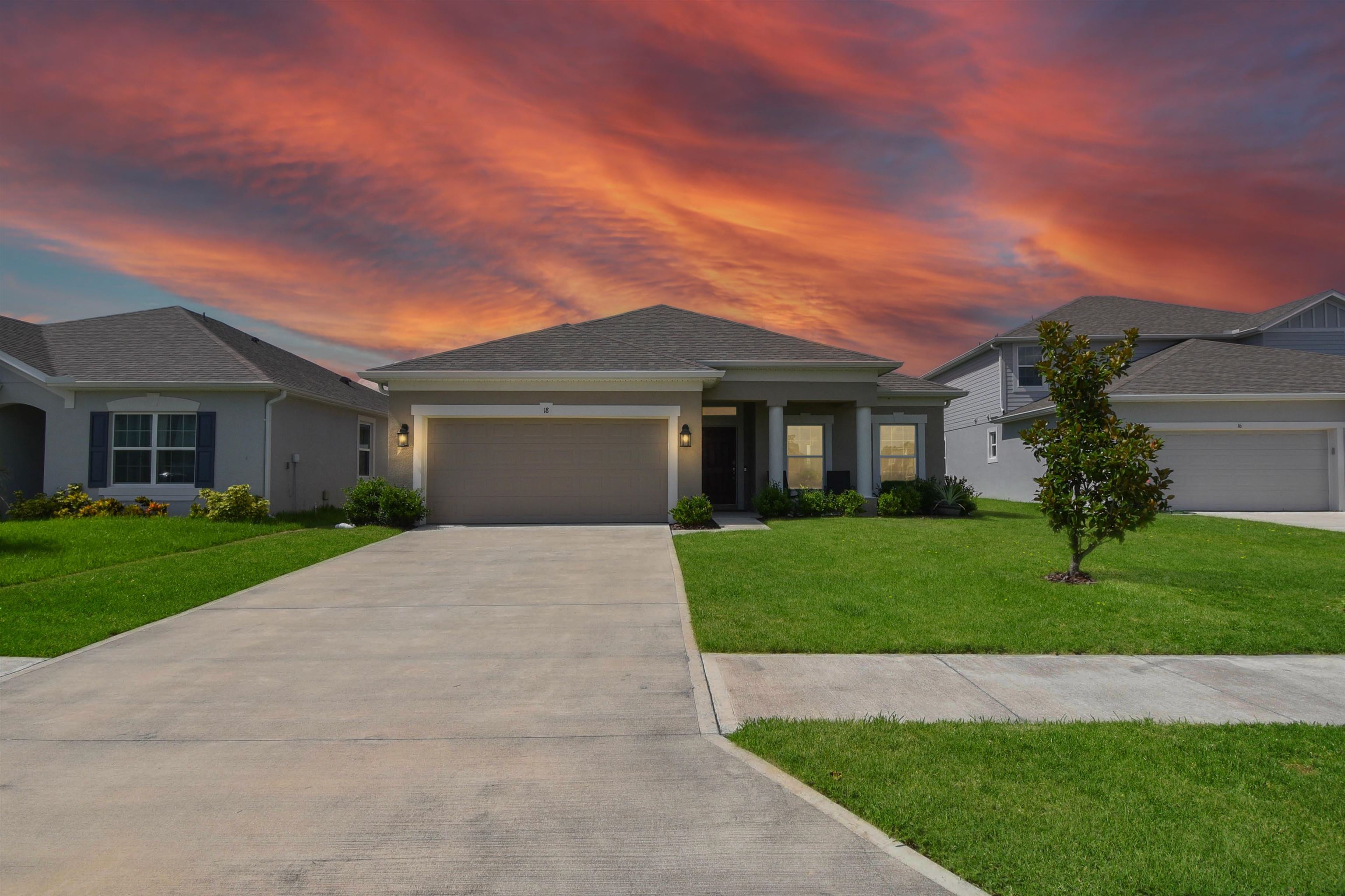 front view of a house and a yard