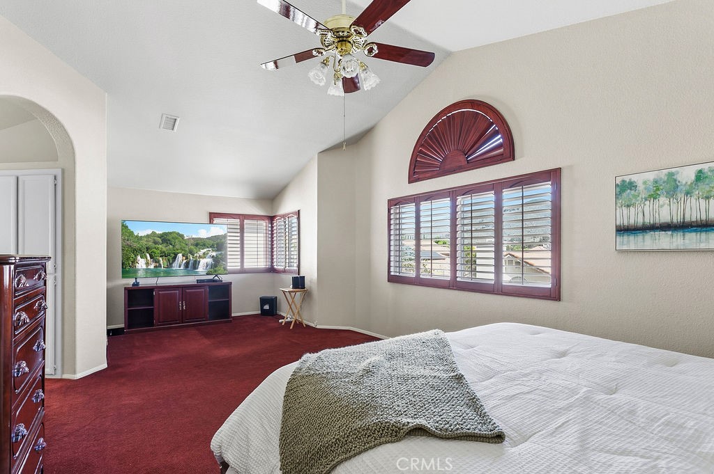 22720 Springmist Drive Moreno Valley, CA 92557 - Photo 14 of 40 a bedroom with bed and a window