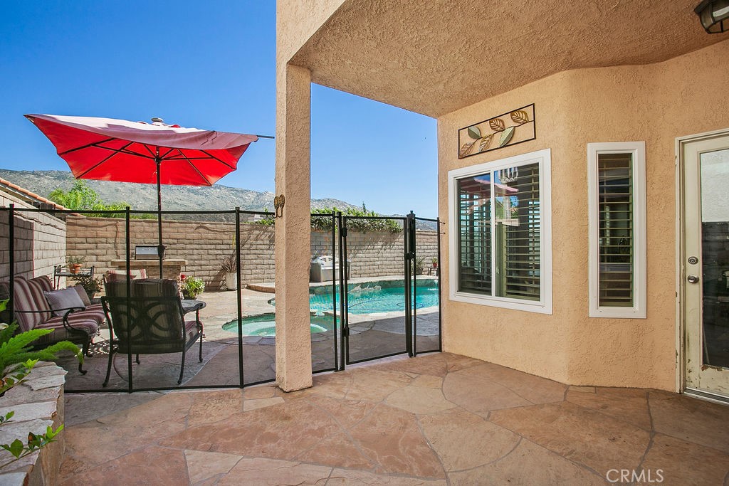 22720 Springmist Drive Moreno Valley, CA 92557 - Photo 29 of 40 a view of the house with patio