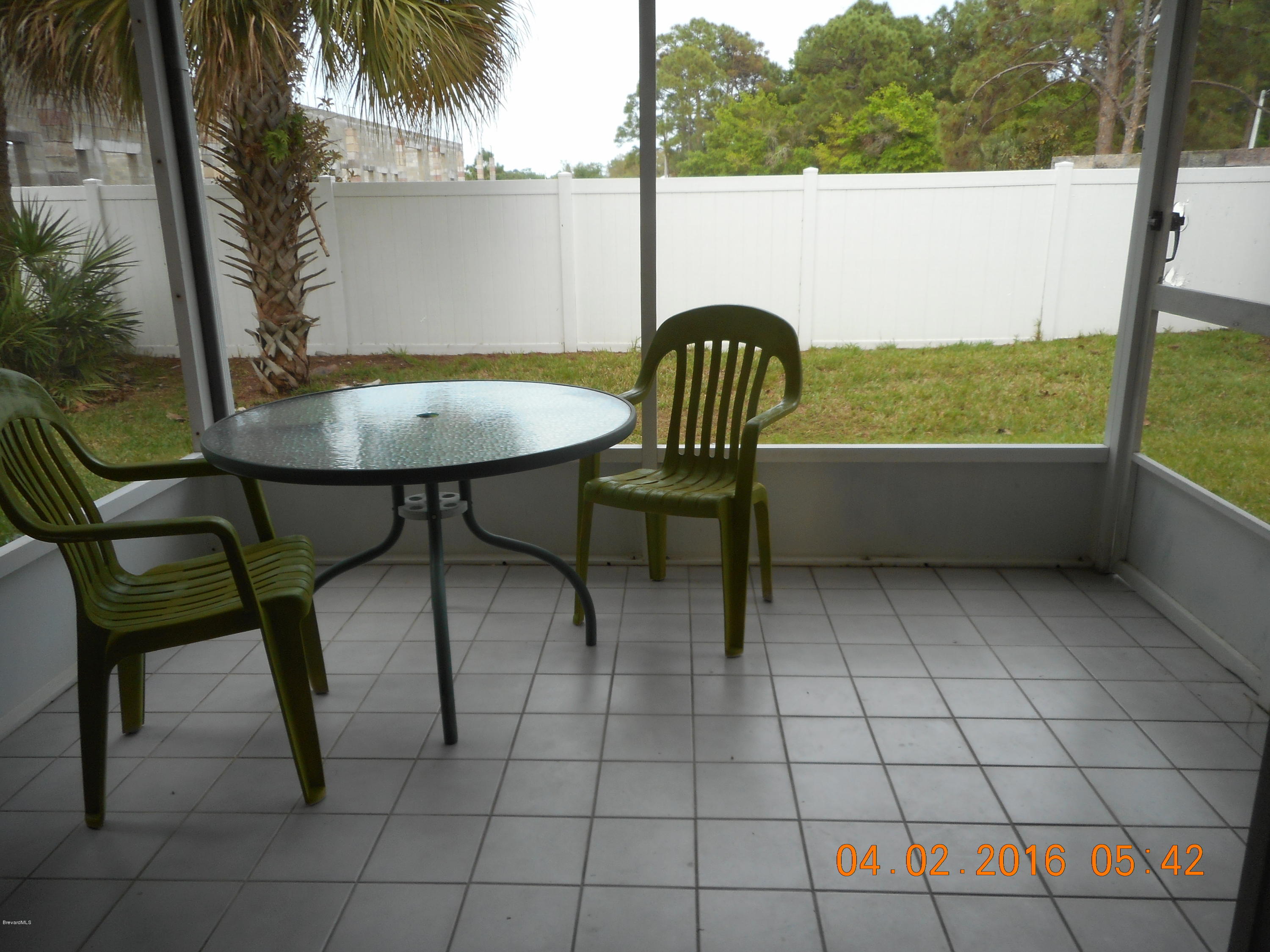 1882 Murrell Road, Unit K41 Rockledge, FL 32955 - Photo 14 of 27 Screened Porch
