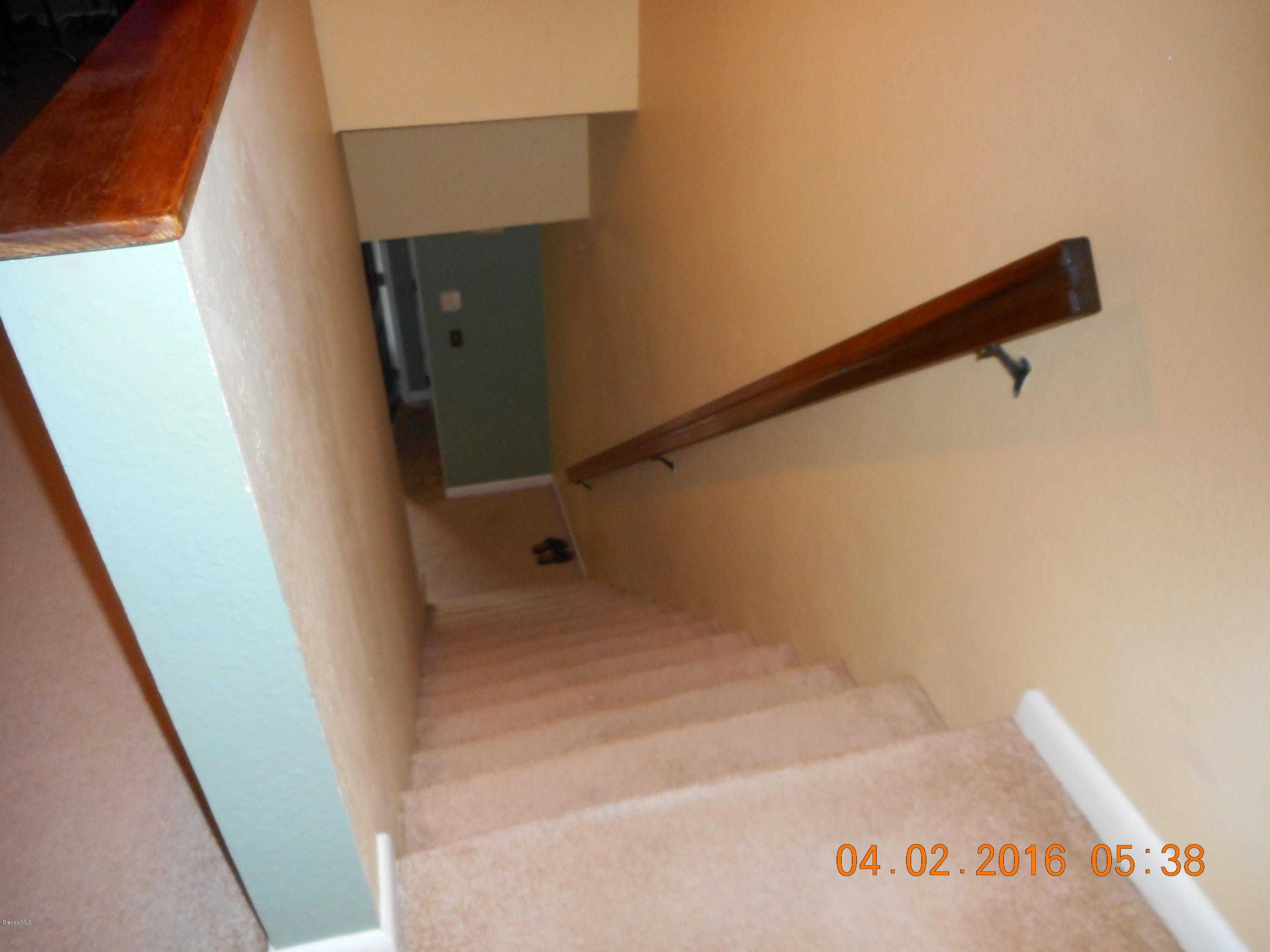 1882 Murrell Road, Unit K41 Rockledge, FL 32955 - Photo 16 of 27 Stairs to Bedrooms