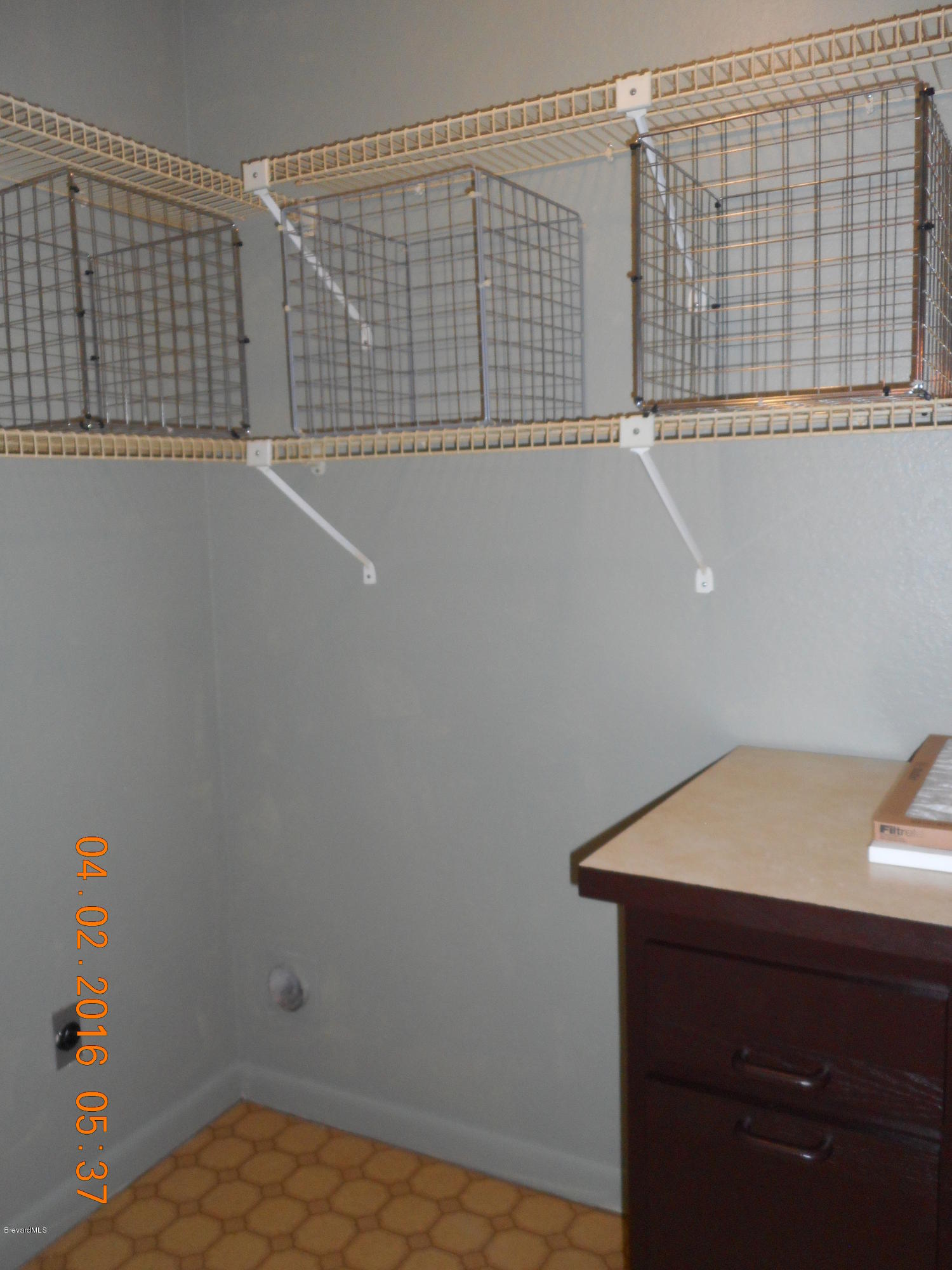 1882 Murrell Road, Unit K41 Rockledge, FL 32955 - Photo 19 of 27 Upstairs laundry