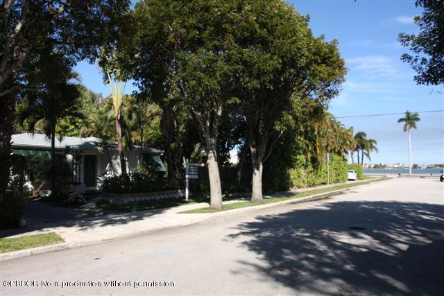 115 Desota Road West Palm Beach, FL 33405 - Photo 2 of 8 a view of road with trees