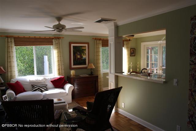 115 Desota Road West Palm Beach, FL 33405 - Photo 3 of 8 a living room with furniture and a large window