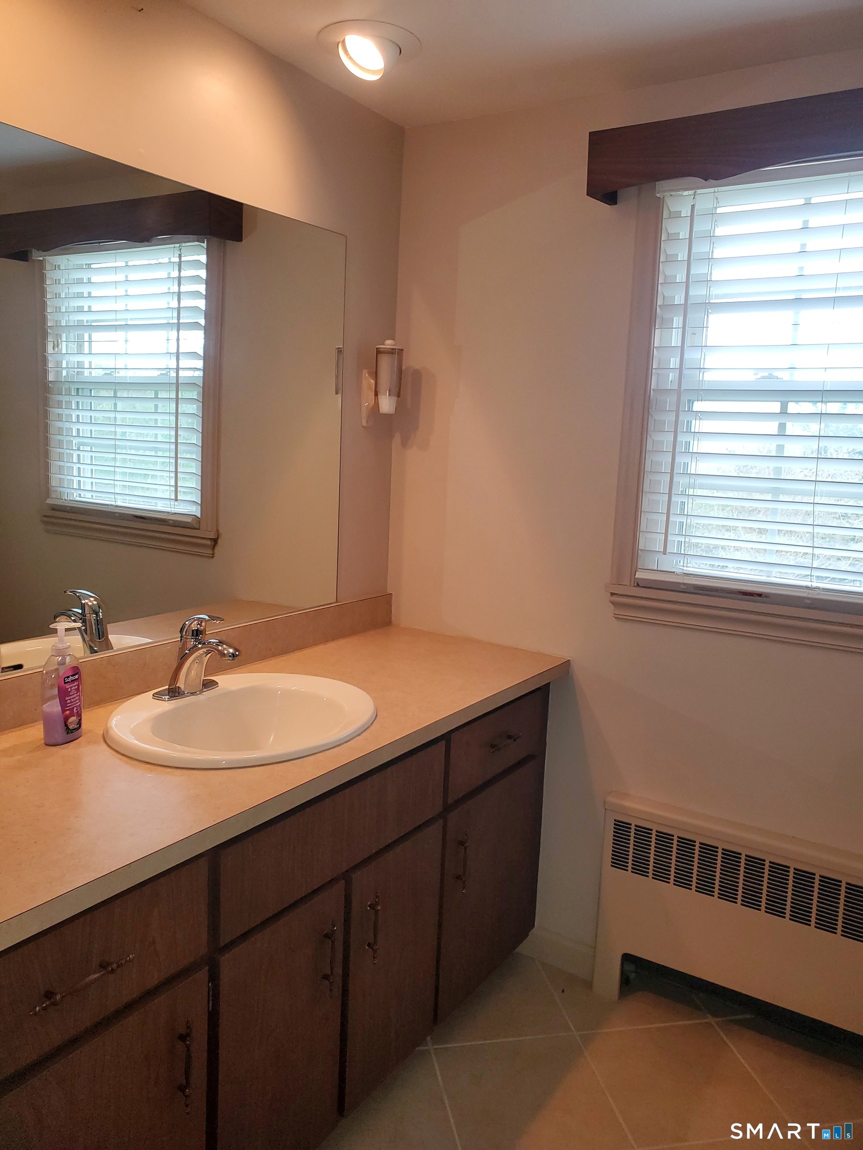 293 Kick Hill Road Lebanon, CT 06249 - Photo 17 of 21 Lovely tile floors in the full bath.