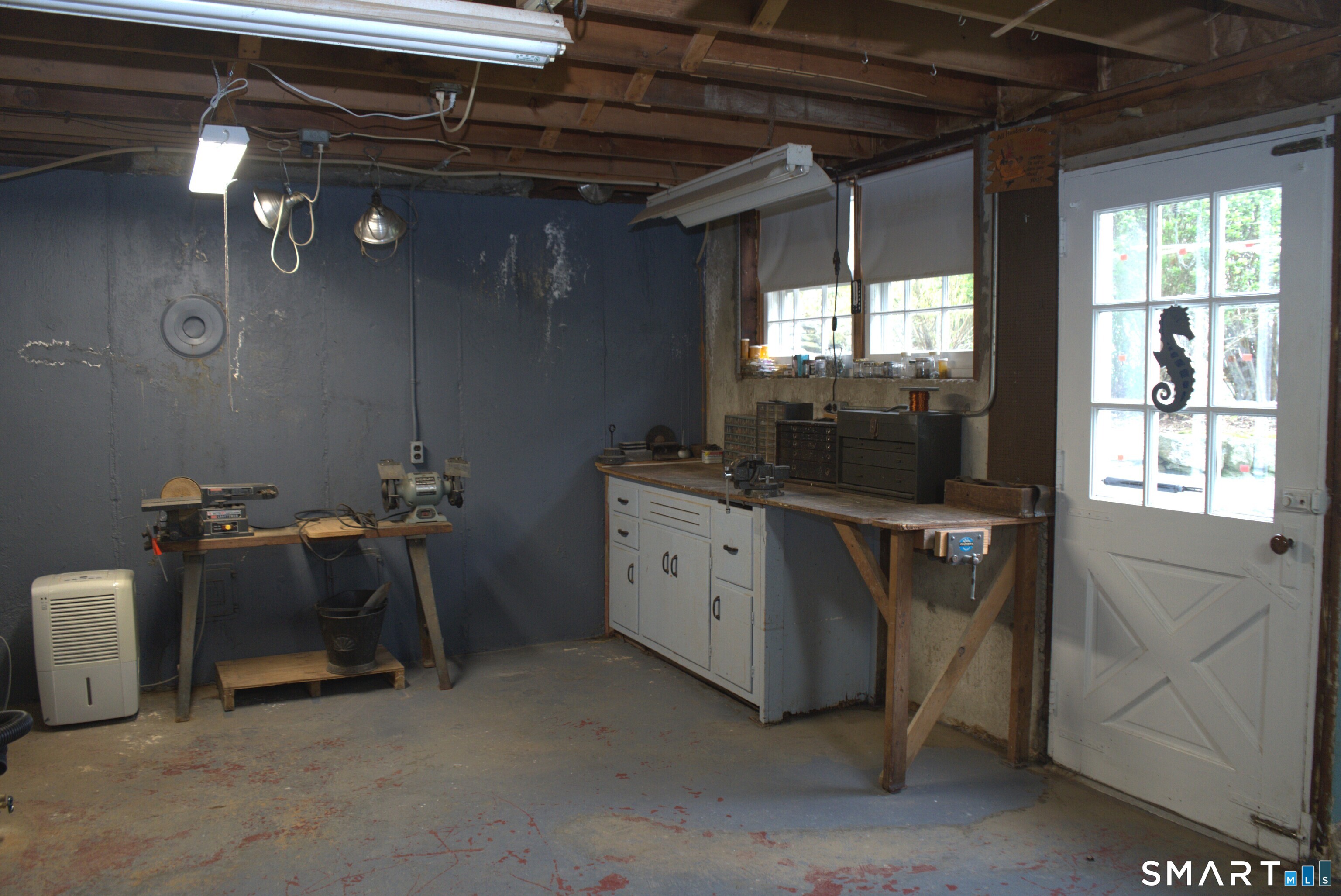 293 Kick Hill Road Lebanon, CT 06249 - Photo 21 of 21 Workbench with bright lights above.