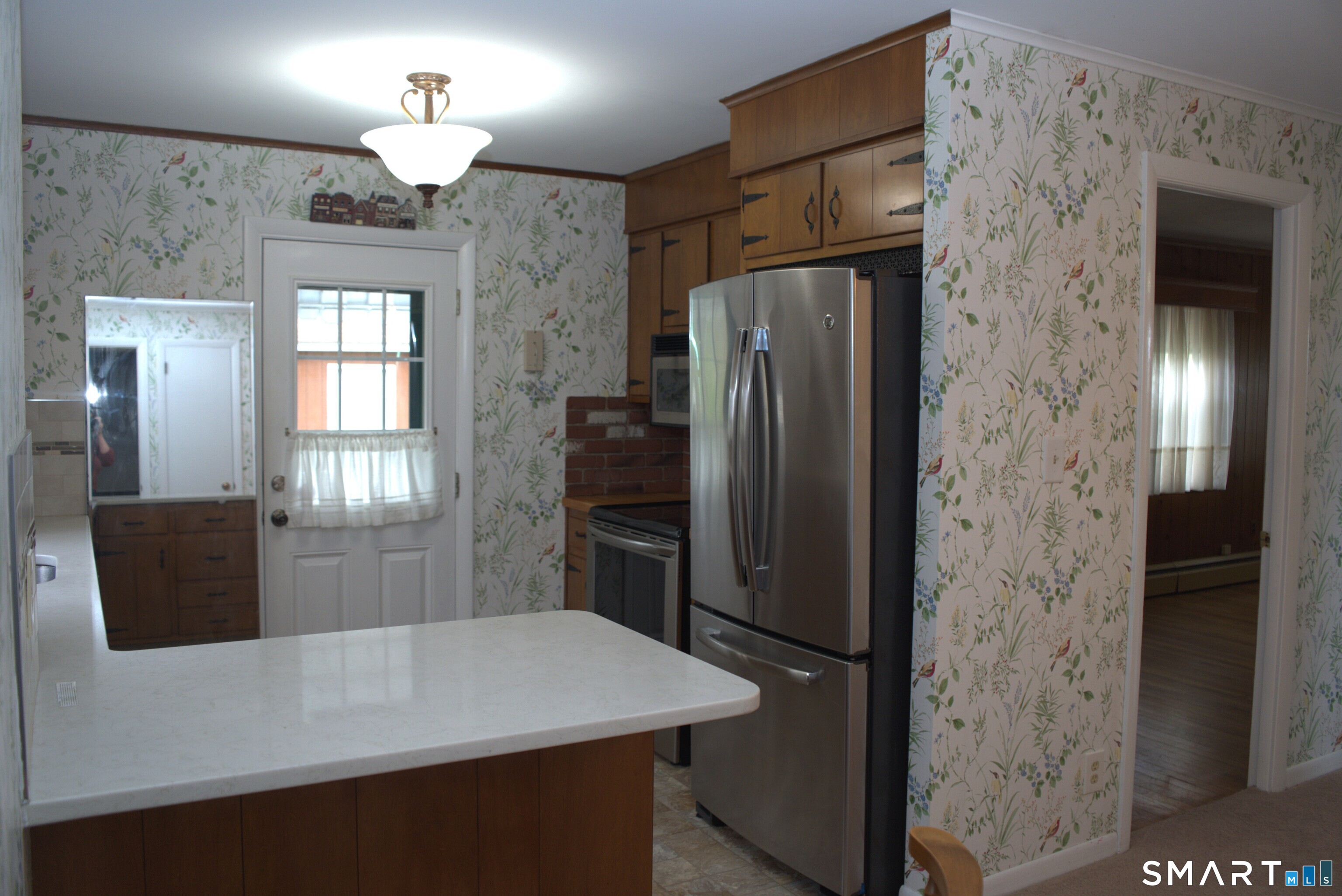 293 Kick Hill Road Lebanon, CT 06249 - Photo 6 of 21 Quartz countertops and stainless steel appliances.
