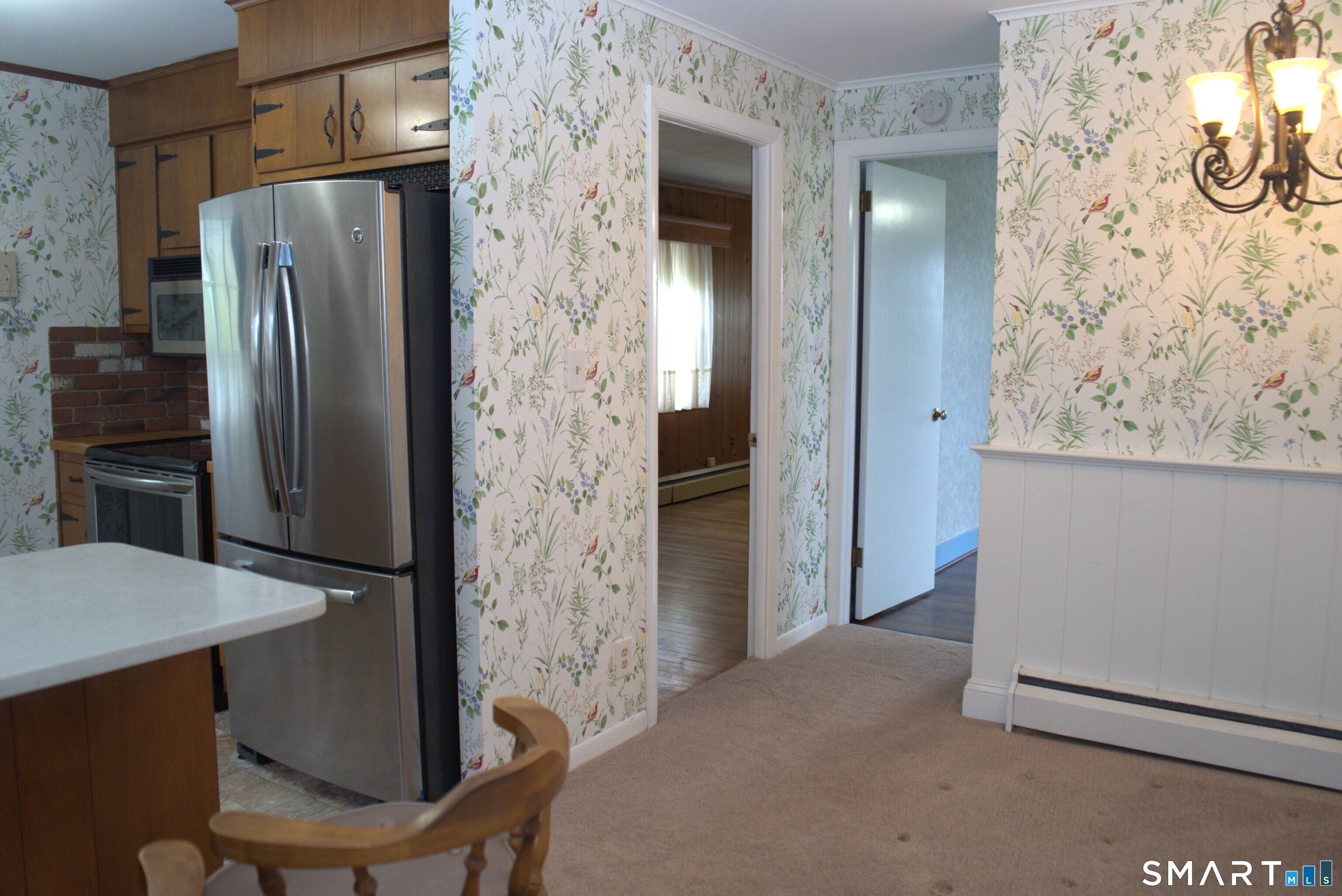 293 Kick Hill Road Lebanon, CT 06249 - Photo 9 of 21 View of dining area to kitchen and bedrooms.