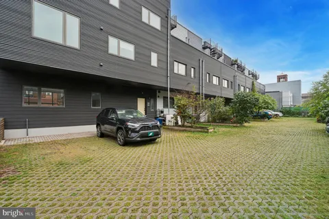 a car parked in front of a building