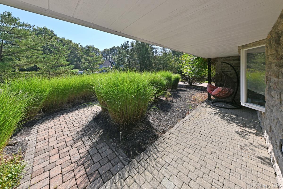 11 Deerwood Road Spring Valley, NY 10977 - Photo 16 of 34 a garden view with a seating space