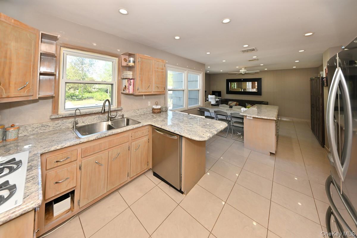 11 Deerwood Road Spring Valley, NY 10977 - Photo 18 of 34 a kitchen with a sink cabinets and window