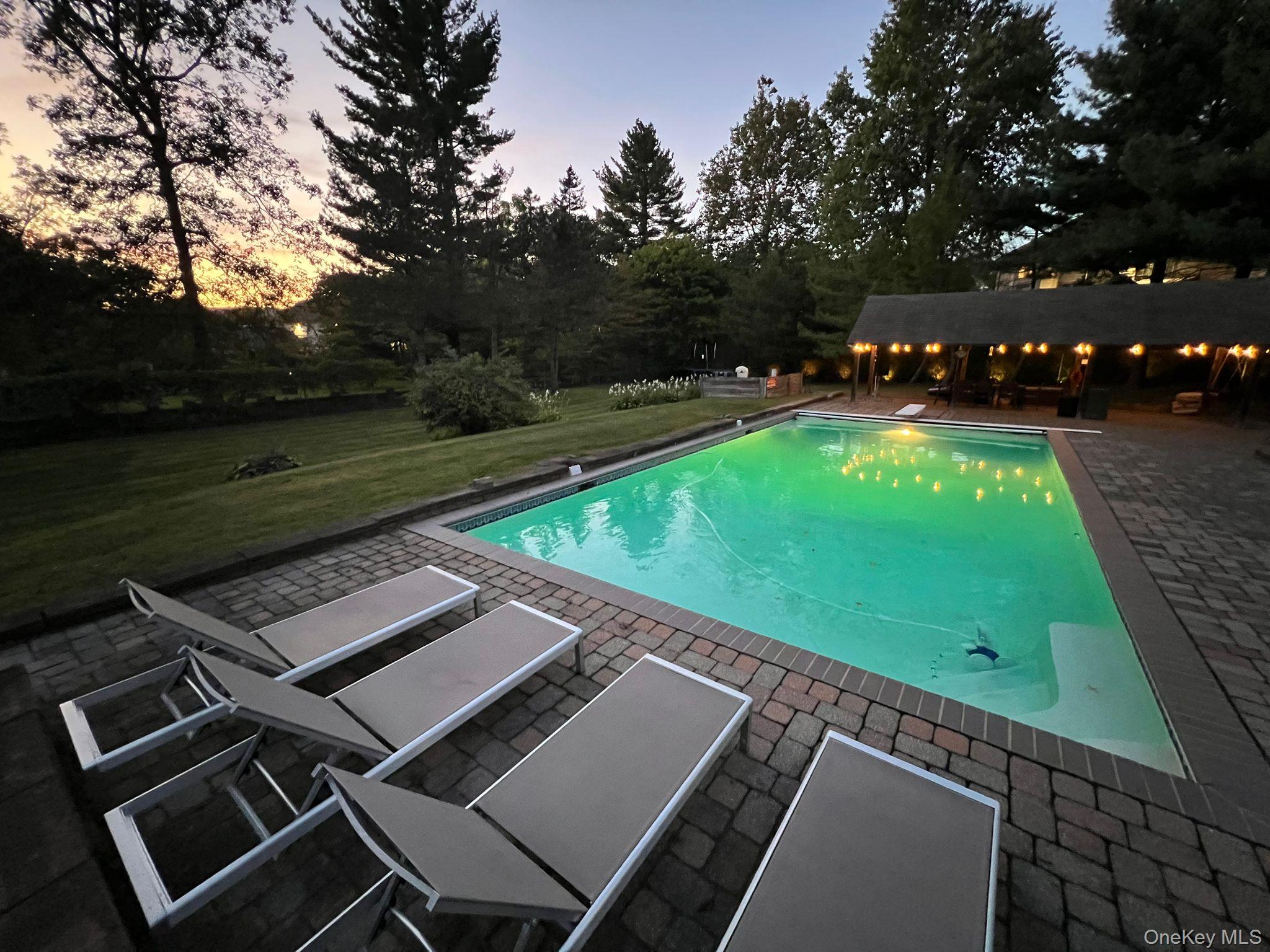 11 Deerwood Road Spring Valley, NY 10977 - Photo 2 of 34 a view of a tennis ground with a large tree