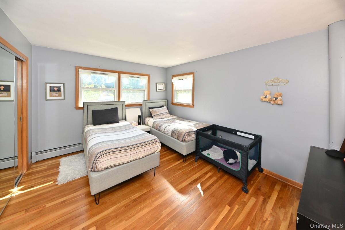 11 Deerwood Road Spring Valley, NY 10977 - Photo 29 of 34 a bedroom with bed and a window