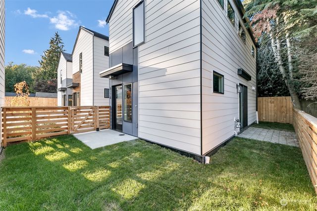 a view of a back yard of the house