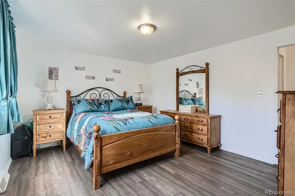 a bedroom with a bed and a closet