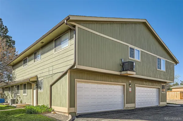 a view of a house with a garage