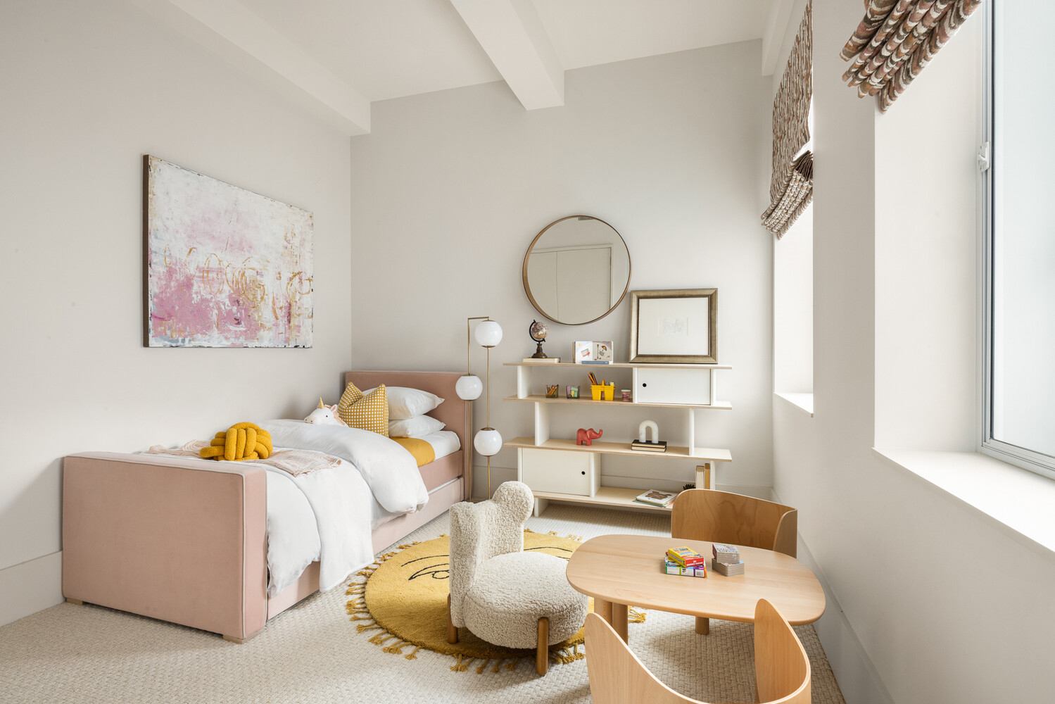 286 Spring Street, Unit 2 Manhattan, NY 10013 - Photo 11 of 14 a living room with furniture and a mirror