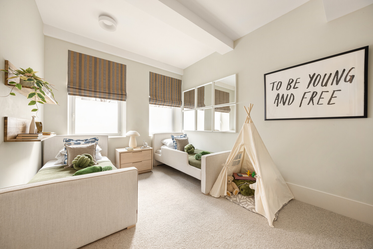 286 Spring Street, Unit 2 Manhattan, NY 10013 - Photo 9 of 14 a living room with furniture and a window