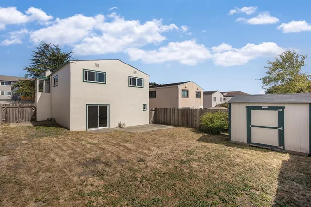 a house view with a garden space