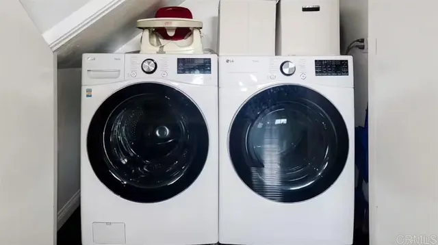 a view of a chairs and table in patio
