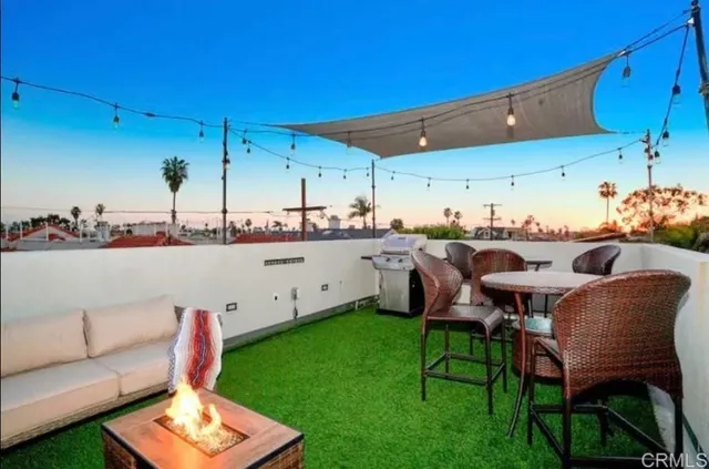 a view of a couch in the roof deck