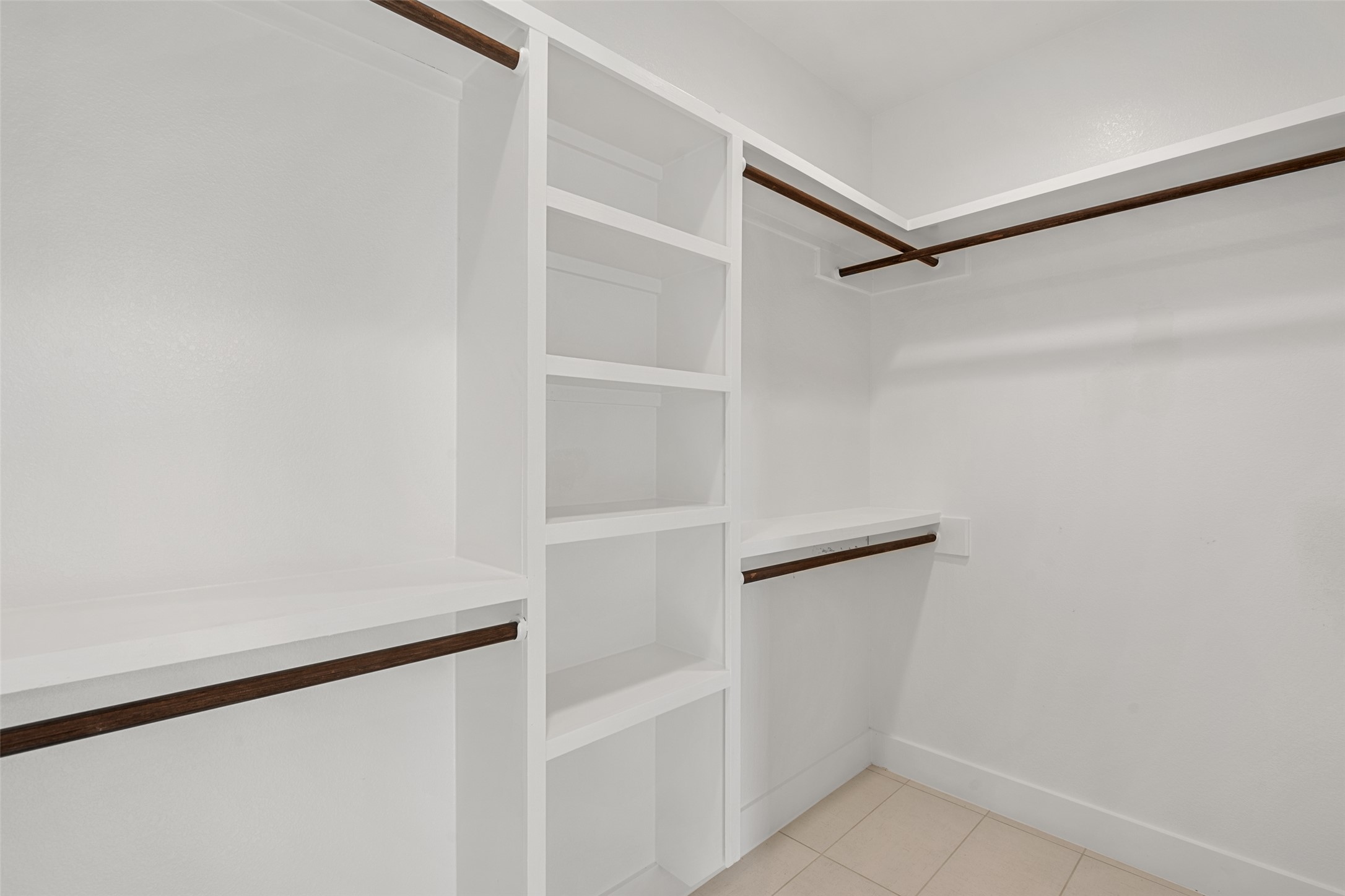 711 Paleface Ranch Road, Unit 3 Spicewood, TX 78669 - Photo 18 of 32 a view of an empty walk in closet