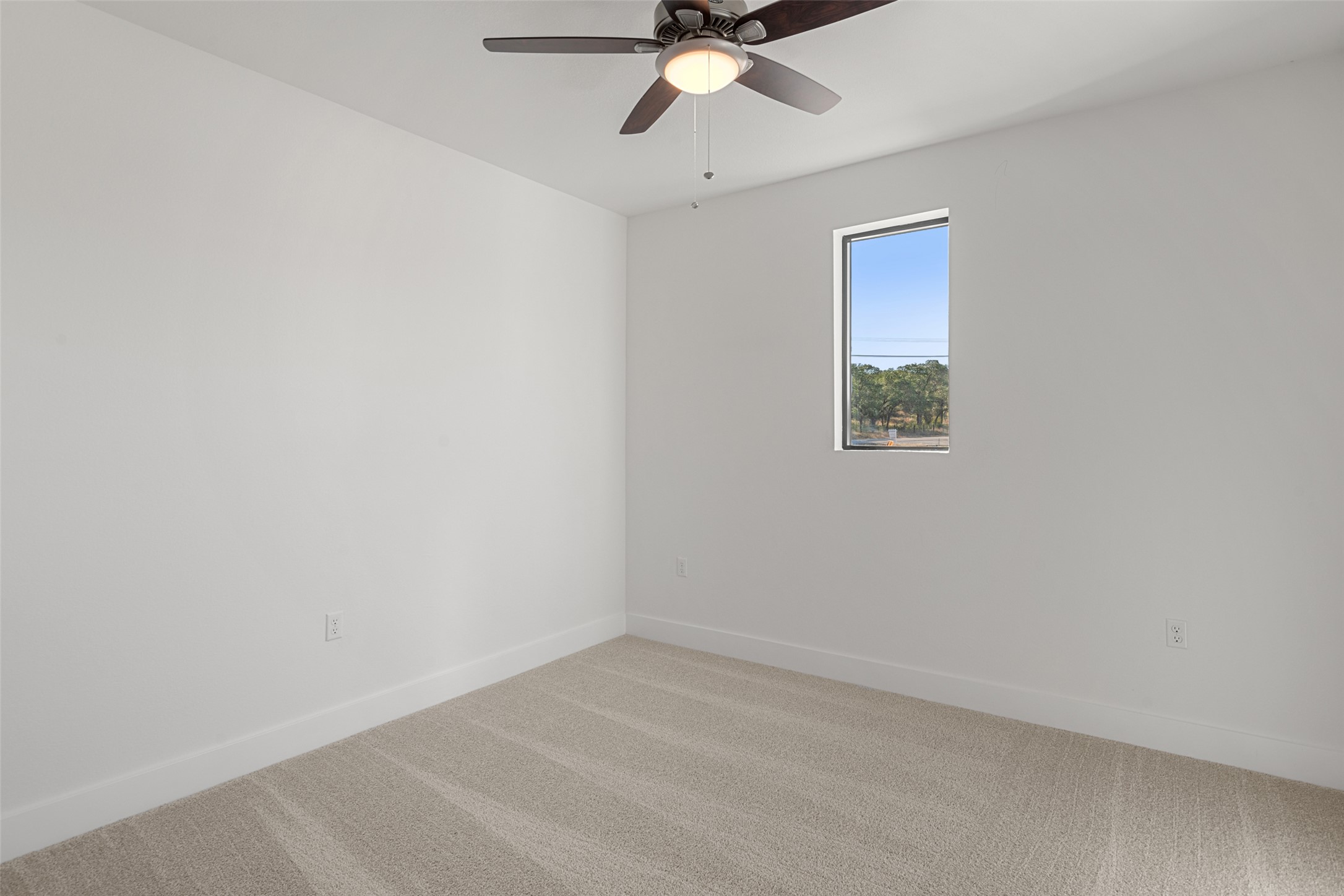 711 Paleface Ranch Road, Unit 3 Spicewood, TX 78669 - Photo 26 of 32 a view of an empty room