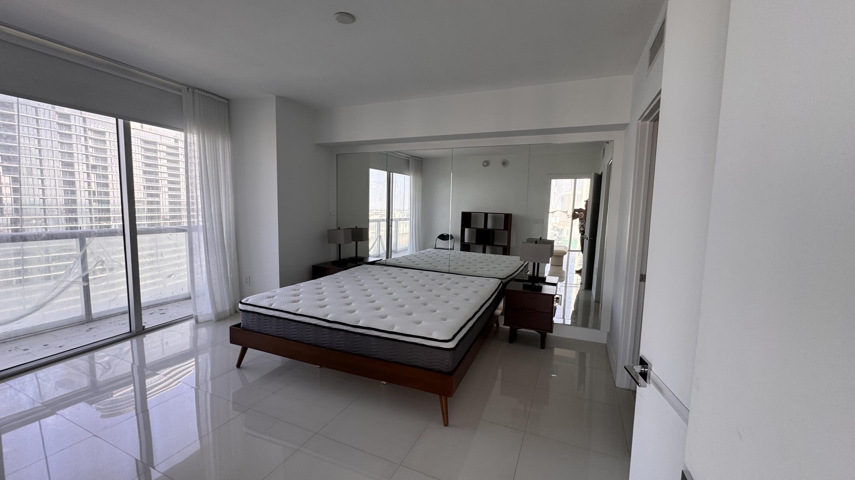 475 Brickell Avenue, Unit 4615 Miami, FL 33131 - Photo 10 of 13 a room with pool table and windows