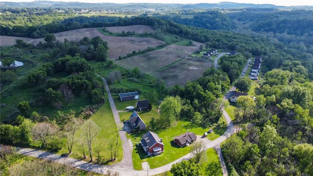 375 Reduction Road Smithton, PA 15479 - Photo 1 of 30 an aerial view of house with outdoor space