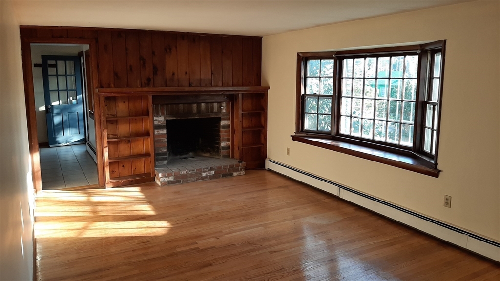 8 Paddock Drive Harwich, MA 02645 - Photo 6 of 12 a view of a fireplace in a room
