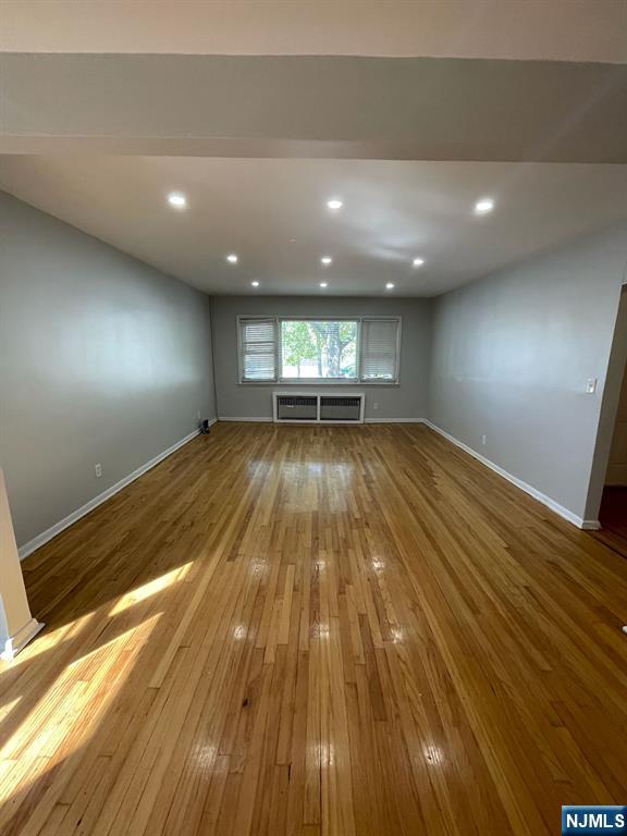 388-390 Leslie Street, Unit 1 Newark, NJ 07112 - Photo 2 of 21 a view of empty room with wooden floor