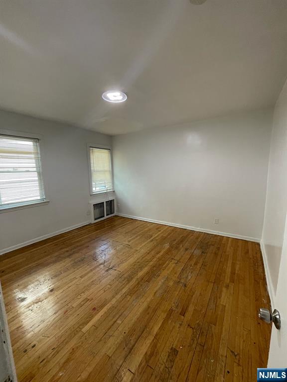388-390 Leslie Street, Unit 1 Newark, NJ 07112 - Photo 8 of 21 a view of empty room with wooden floor
