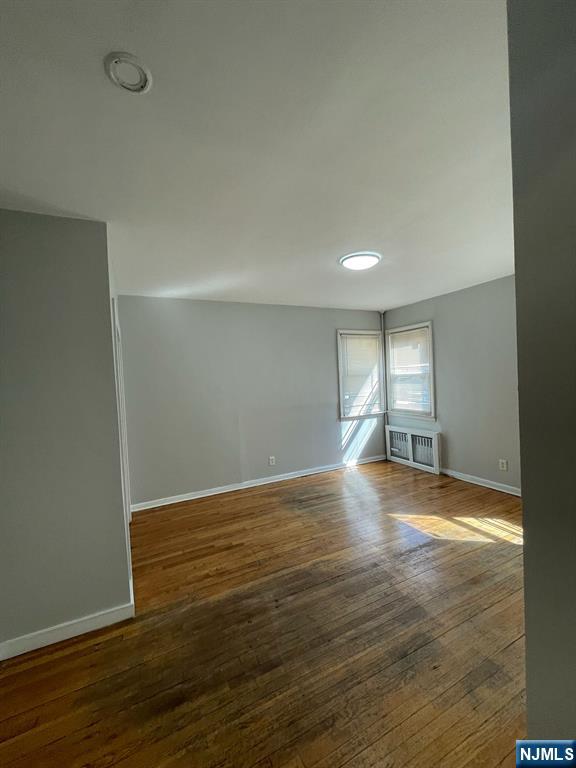388-390 Leslie Street, Unit 1 Newark, NJ 07112 - Photo 9 of 21 a view of empty room with wooden floor