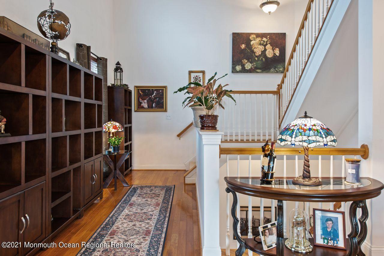 501 Abby Road Middletown, NJ 07748 - Photo 18 of 36 a view of entryway and hall with wooden floor