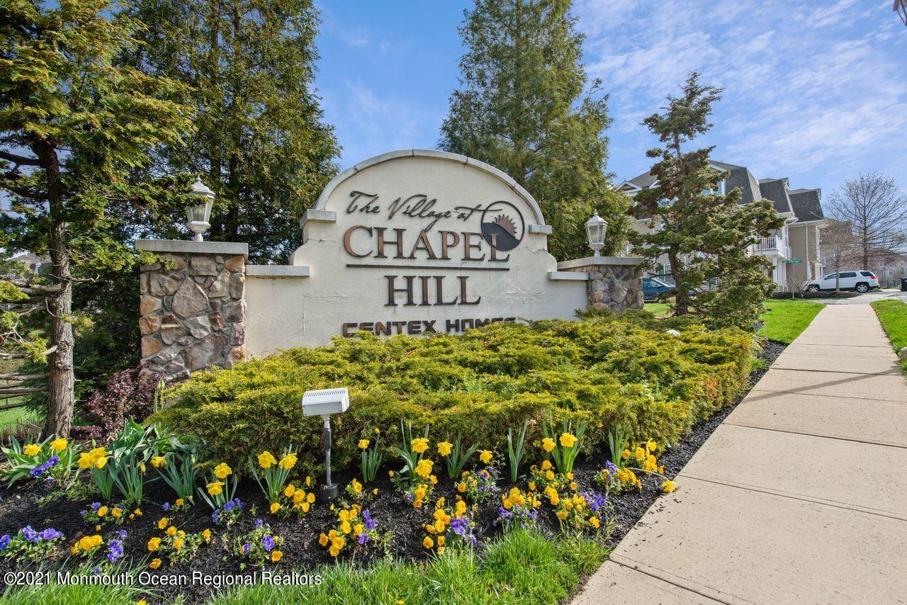 501 Abby Road Middletown, NJ 07748 - Photo 36 of 36 a sign that is sitting in front of flowers