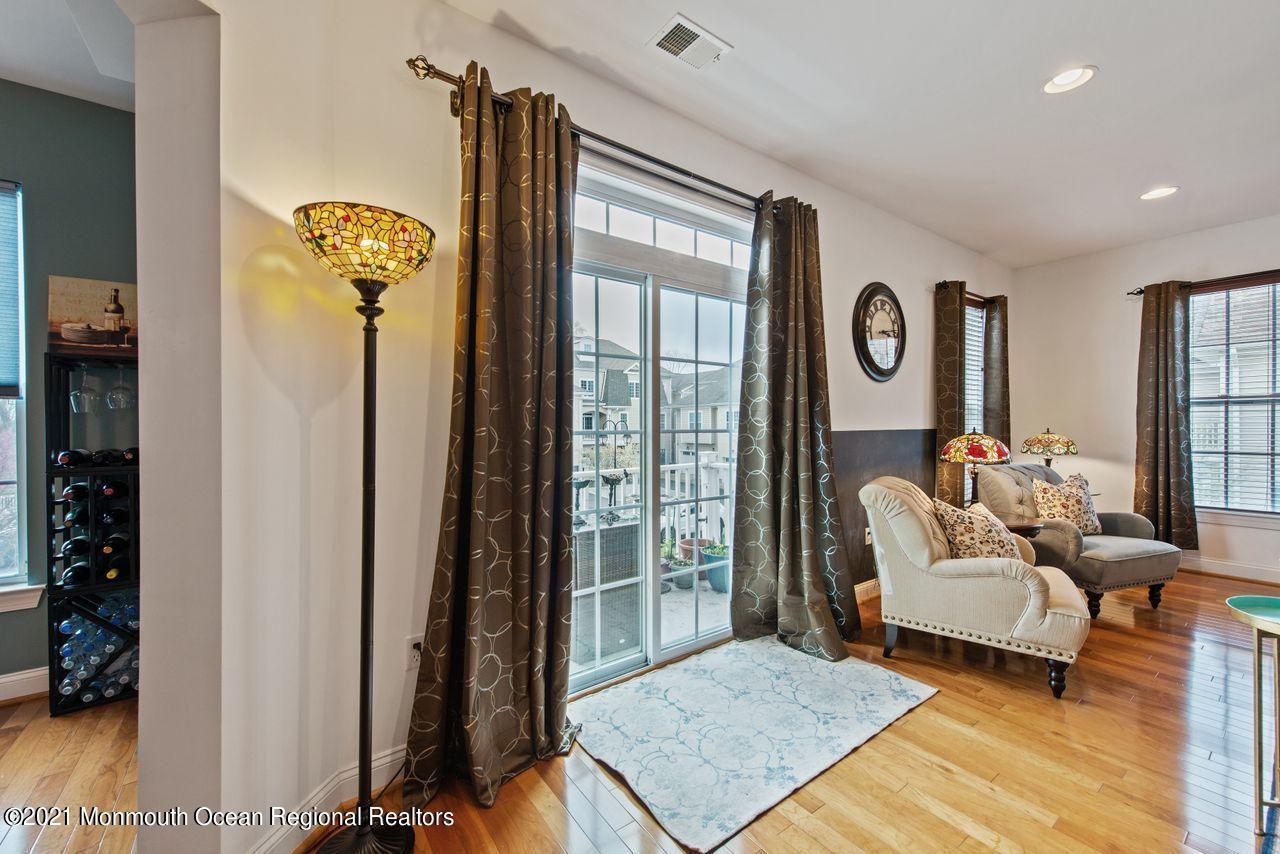501 Abby Road Middletown, NJ 07748 - Photo 7 of 36 a living room with furniture and a window