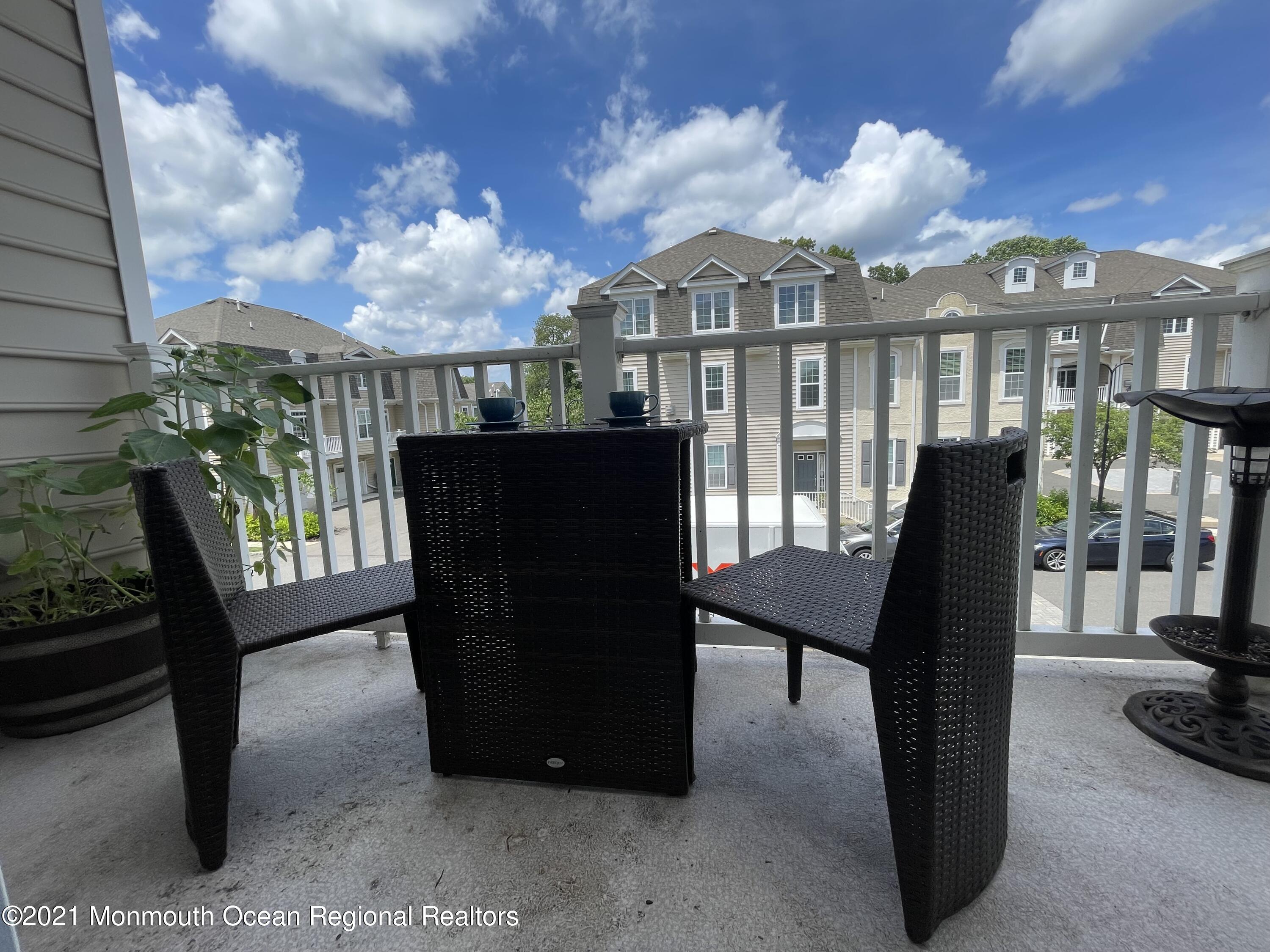 501 Abby Road Middletown, NJ 07748 - Photo 8 of 36 a view of a chairs and table in the patio