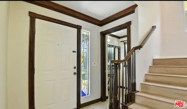 a view of an entryway with staircase