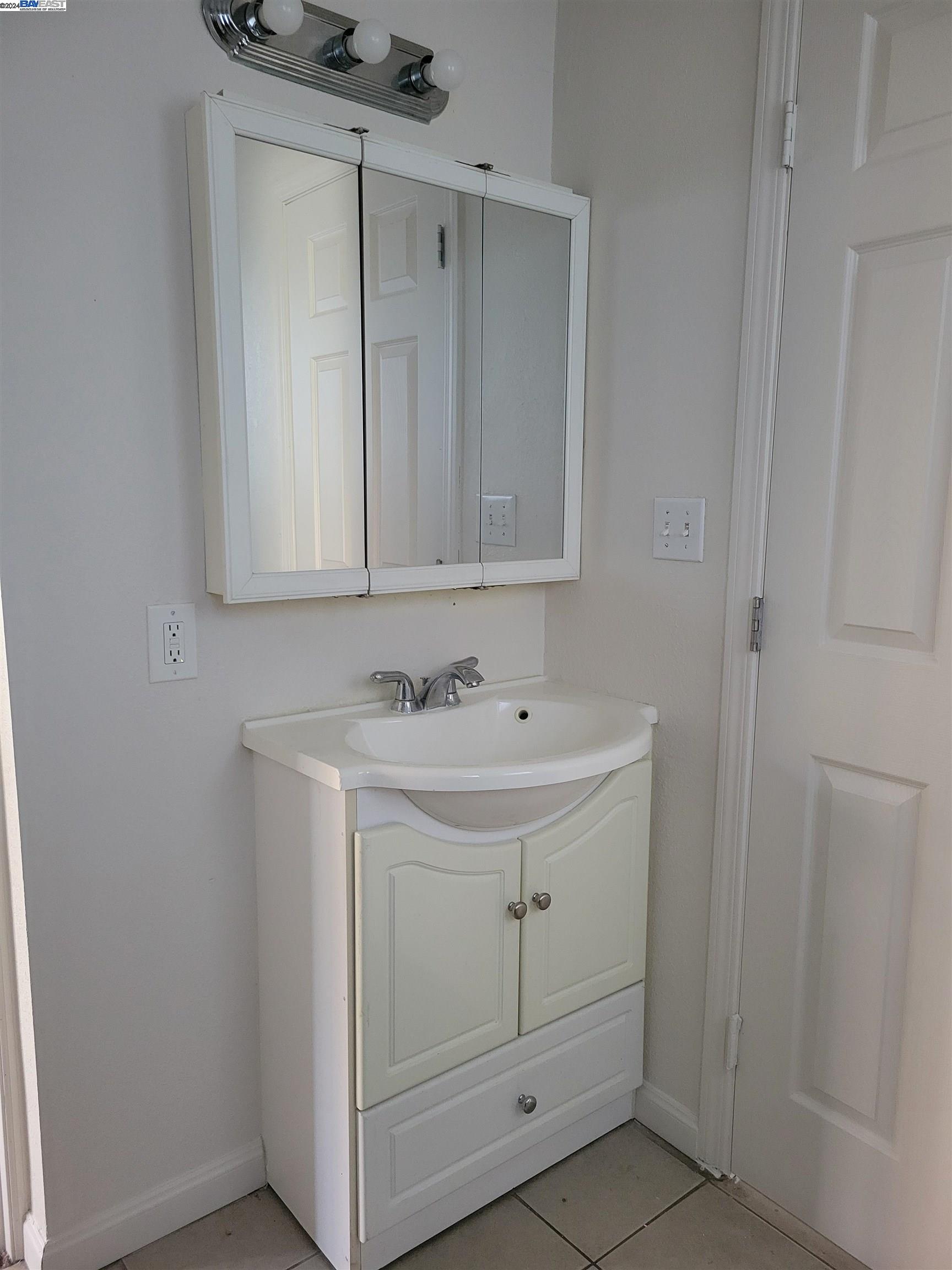 Toler Heights Oakland, CA 94605 - Photo 11 of 18 a utility room with cabinets