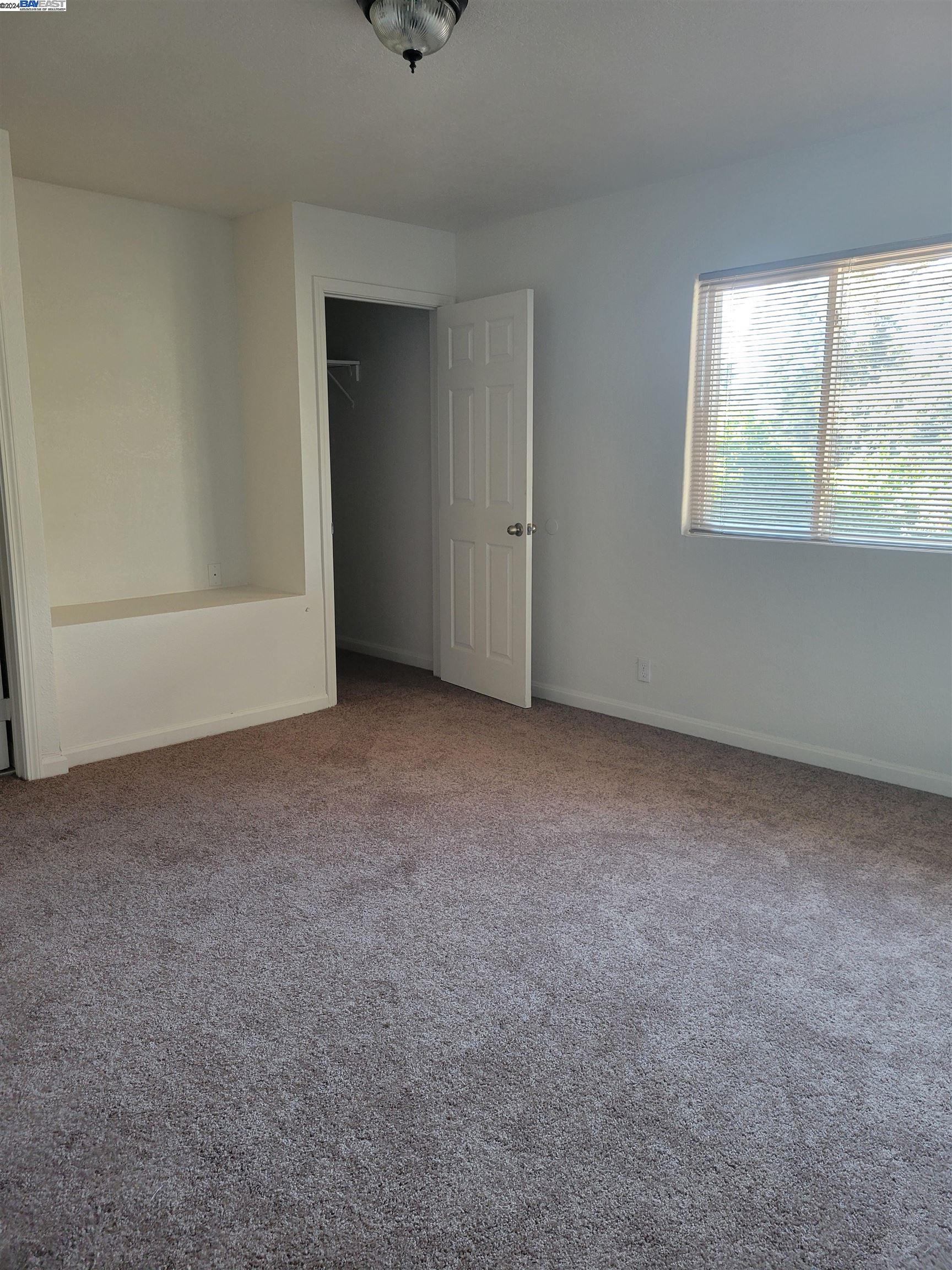 Toler Heights Oakland, CA 94605 - Photo 12 of 18 a view of an empty room with a window