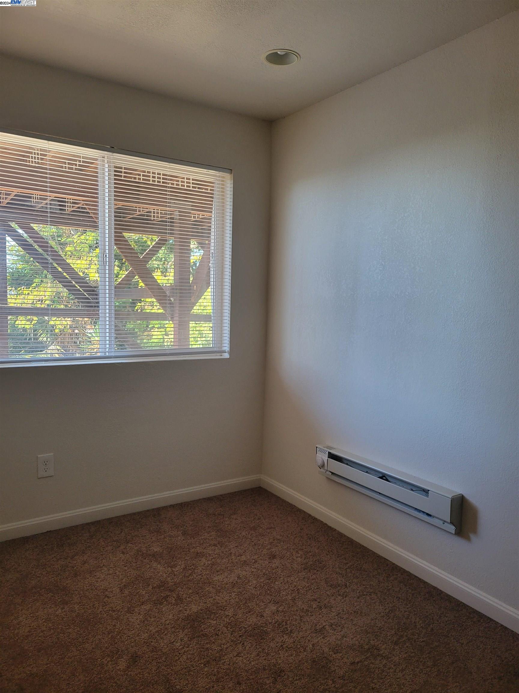Toler Heights Oakland, CA 94605 - Photo 15 of 18 an empty room with a window